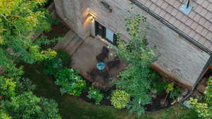 Aerial view of basement entrance and patio