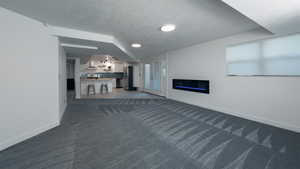 Basement family room with 60" electric fireplace