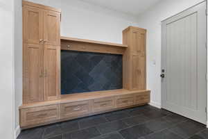 Mudroom with baseboards