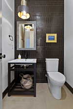 Bathroom with baseboards and vanity