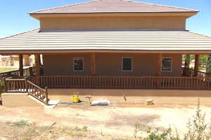 Rear view of house with a tiled roof