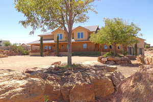 Rear view of house with a porch