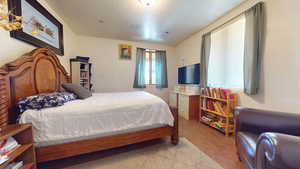 Bedroom featuring light tile patterned floors