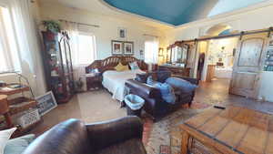 Bedroom with a barn door