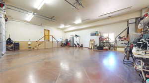 Garage with stainless steel fridge