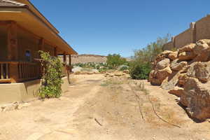 View of yard with a mountain view