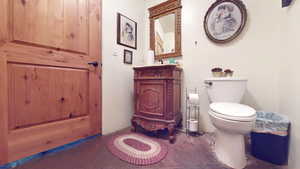 Bathroom featuring toilet and vanity