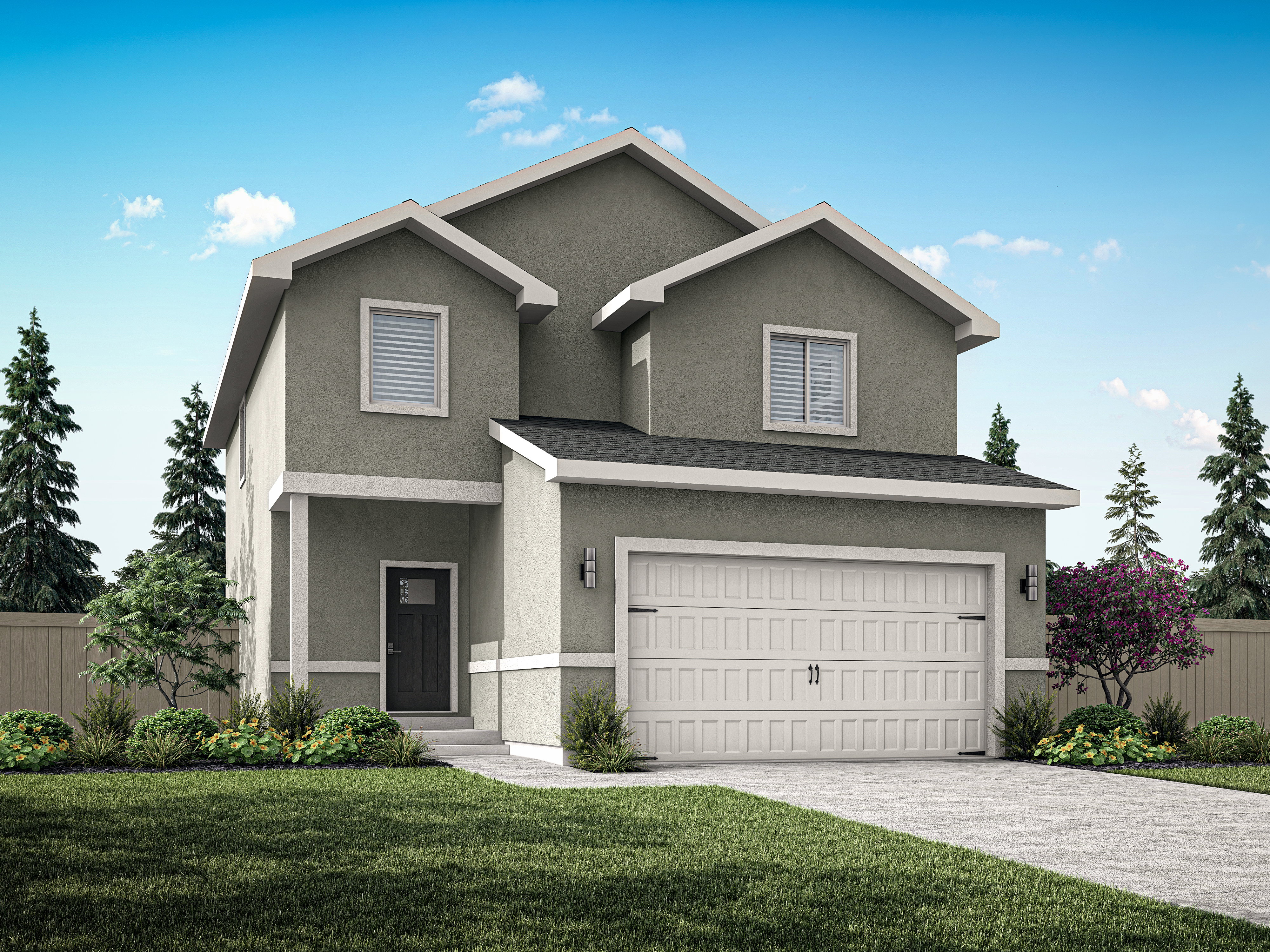 Traditional-style home featuring stucco siding, driveway, and an attached garage