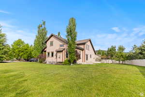View of home's exterior with a cooling unit