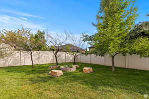 View of fenced backyard