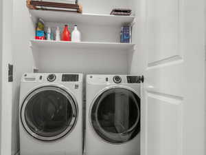 Washroom featuring separate washer and dryer