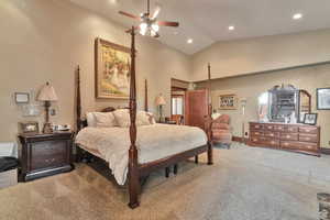 Bedroom featuring carpet floors, recessed lighting, ceiling fan, and high vaulted ceiling