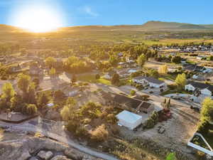 Aerial perspective of suburban area featuring a mountain backdrop