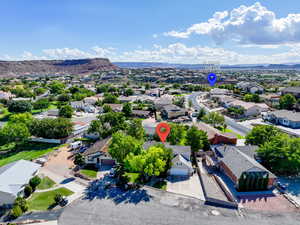 Aerial view of residential area with a mountain backdrop