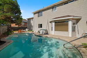 View of pool with a patio