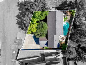 Aerial overview of property's location featuring a pool area and property boundaries highlighted