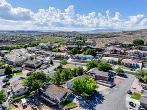 Aerial view of residential area with a mountainous background