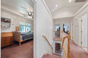 Stairs featuring carpet floors, lofted ceiling, and recessed lighting