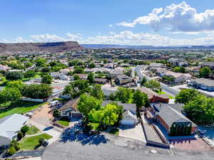 Aerial view of residential area featuring a mountain backdrop
