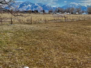 View of yard featuring a mountain view and a rural view