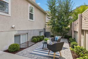 Fenced backyard with a patio area