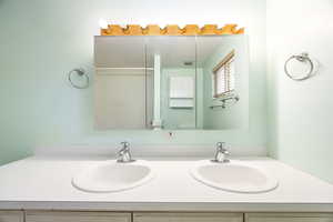 Bathroom featuring double vanity