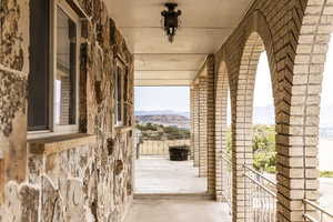 Patio / terrace with a mountain view