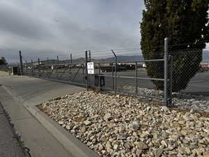 View of street with a gate and curbs