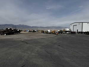 View of parking / parking lot with a mountain view