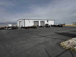 View of vehicle parking with a mountain view
