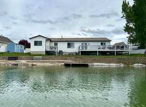 Back of property with private beach right on the lake