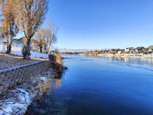Retaining wall and view of the lake West of deck.