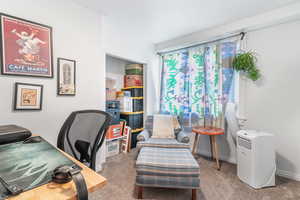 Office area with carpet flooring