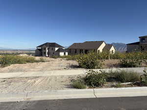View of front of house featuring a mountain view