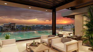 View of swimming pool featuring outdoor lounge area, an infinity pool, and a patio area