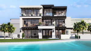 Back of property with a balcony, a yard, and stucco siding