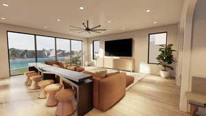 Living area with recessed lighting and light wood-type flooring