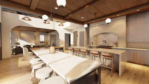 Dining room with arched walkways, light wood-style floors, a wood ceiling with exposed beams, and recessed lighting