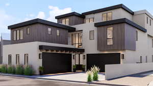 Contemporary home featuring a garage, concrete driveway, and stucco siding