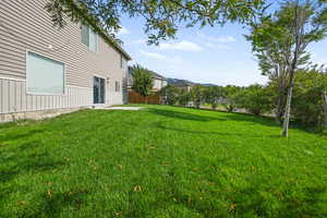 View of yard with a patio