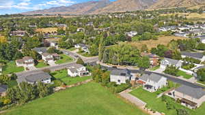 View of property location featuring nearby suburban area and a mountainous background