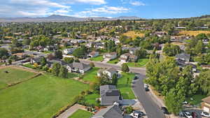 View of property location featuring a mountain backdrop and nearby suburban area