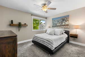 Bedroom with carpet and ceiling fan