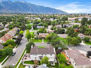 Aerial view of residential area featuring mountains