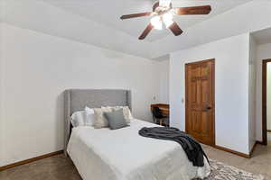 Bedroom with carpet flooring and ceiling fan