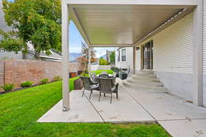 View of patio / terrace featuring entry steps and a mountain view