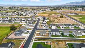 Aerial view of residential area with a mountain backdrop