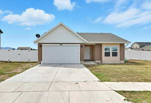 Ranch-style home with concrete driveway, an attached garage, a gate, and a shingled roof