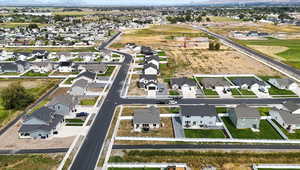 Aerial overview of property's location with nearby suburban area