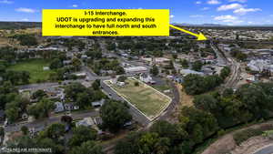 Aerial overview of property's location with nearby suburban area